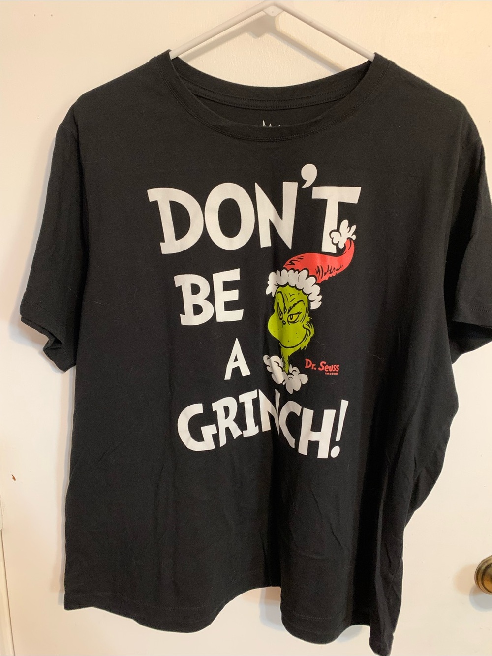 Dr. Seuss Black Tee with Grinch Graphic and Red Hat